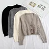 Short style high-waisted slim plastic sweater women 2023 spring new single-breasted knitted cardigan twist small jacket 1