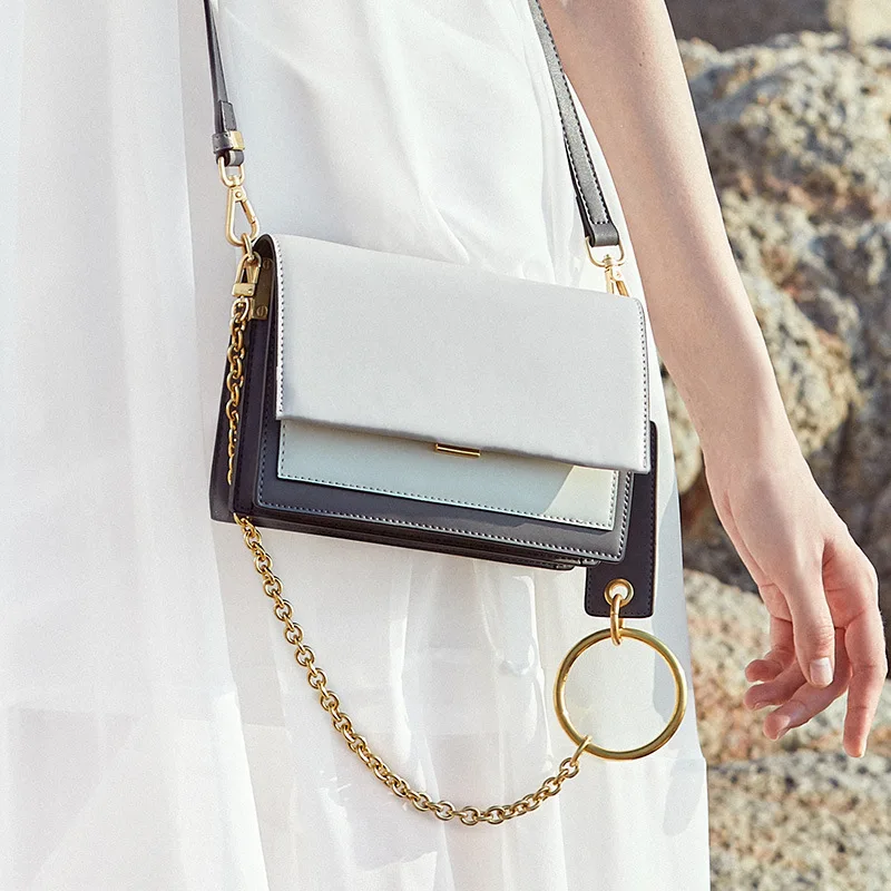 

Summer cousin Xiaofang Baonu 2019 New Retro simple ring handbag with lady's bag on oblique side