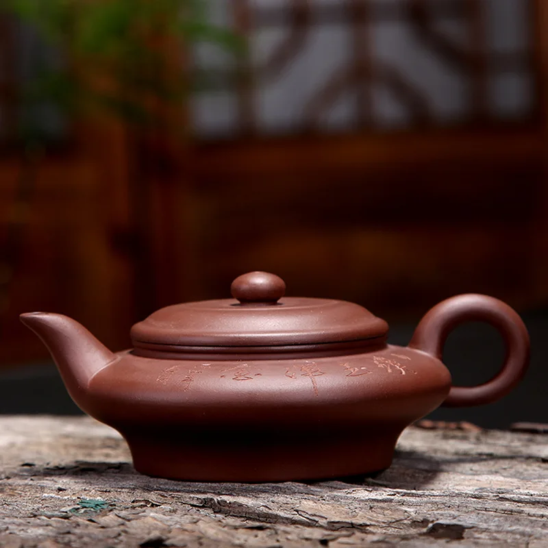 

Flat Ancient Yixing Clay Teapot Wholesale pu yu hun jin Tea Pot Manufacturers Large Size Water Flat Oval Tea Pot Tea Set Customi