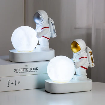 

Home decoration accessories Astronaut holding a moon shaped night light Living room bedroom TV cabinet Christmas present space
