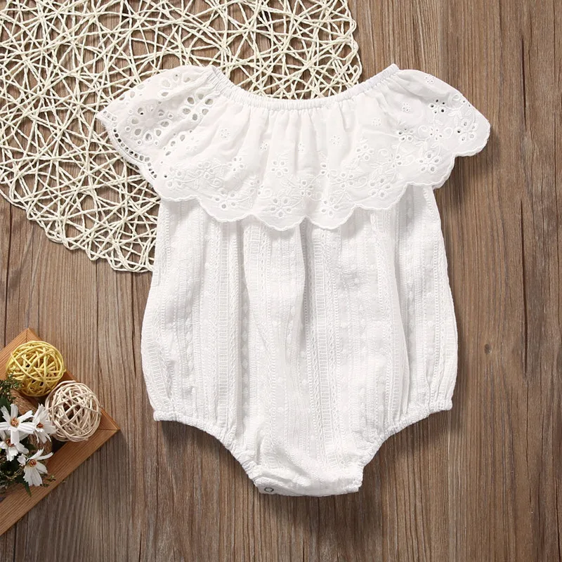 white ruffle baby romper
