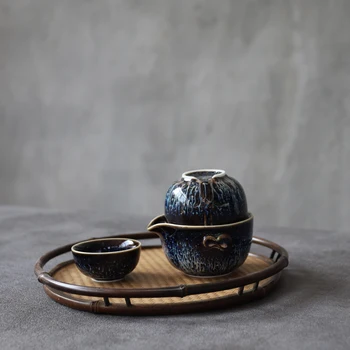 

The ceramic kiln becomes a Teacup quick guest cup, one pot, two cups, convenient Tea Cup, personal kung fu Teacup Set tcp35