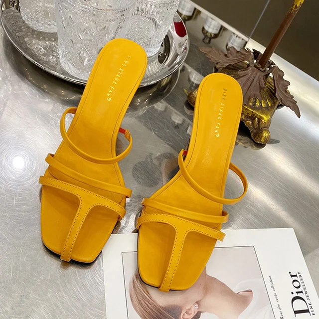yellow heeled mules