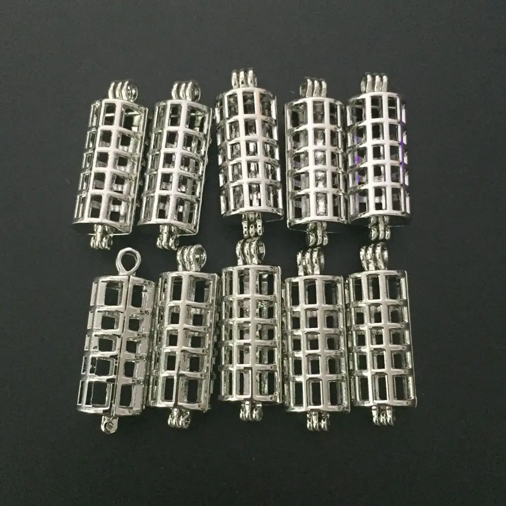 

Wholesale Cross Cylinder Locket Essential Oil Diffuser Add Your Pompons, Beads, Pearls, Stones Cage Pendant For Necklace Making