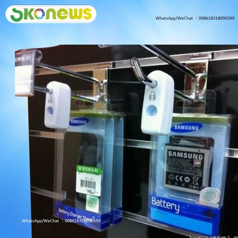 Stoplock_for_EAS_plastic_retail_shop_display_hook_anti_sweep_theft_lock_catch_pegboard_slatwall_with_magnet_unlock_key
