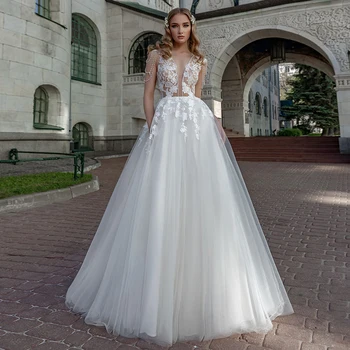 

Exquisite Tulle Wedding Gowns 2020 Sheer V-neck Applique Beading Court Train Sleeveless A-line Bridal Dresses