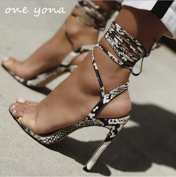 

Women's shoes 2019 summer new fish mouth hollow transparent belt snake pattern lace high high heel sexy ladies sandals a327