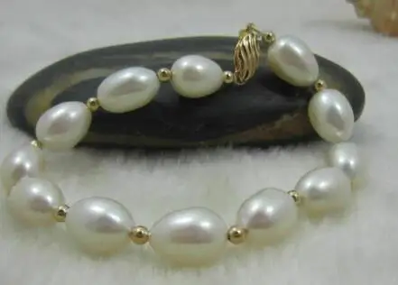 

NATURAL AAA SOUTH SEA 10-11MM WHITE PEARL BRACELET 7.5-8"