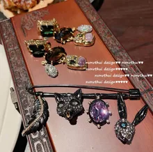 

black zircon fox rabbit pendant brooch classic snake ring for women Champagne vintage green flash diamond luxurious ear clip