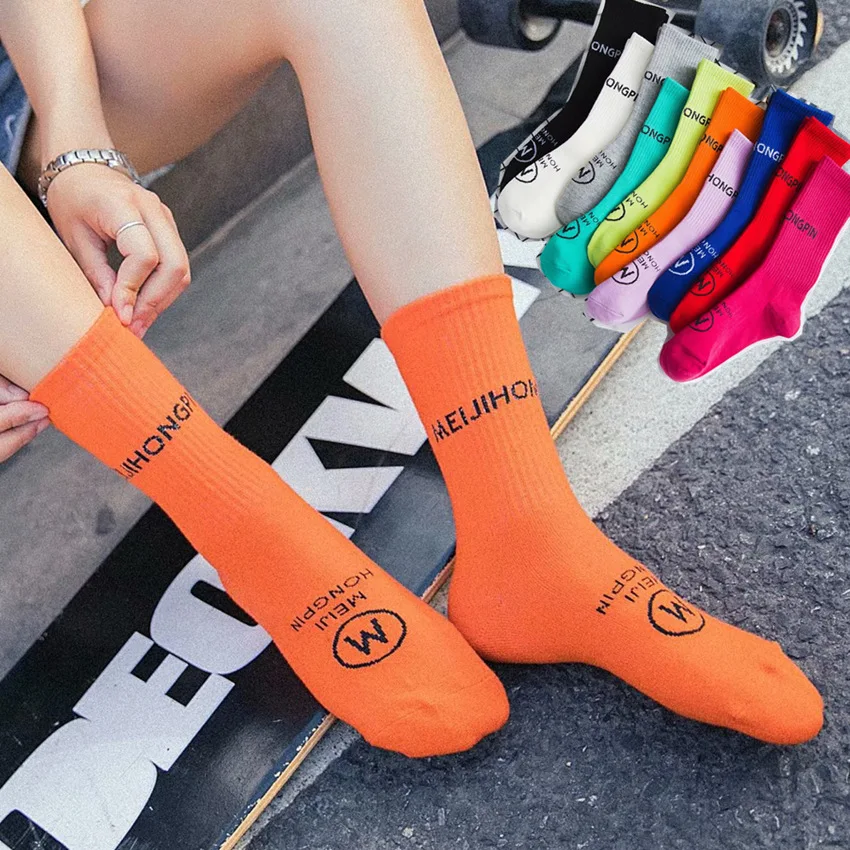 

New ladies candy color tide brand stockings skateboard letters sports high tube cotton socks European and American female socks