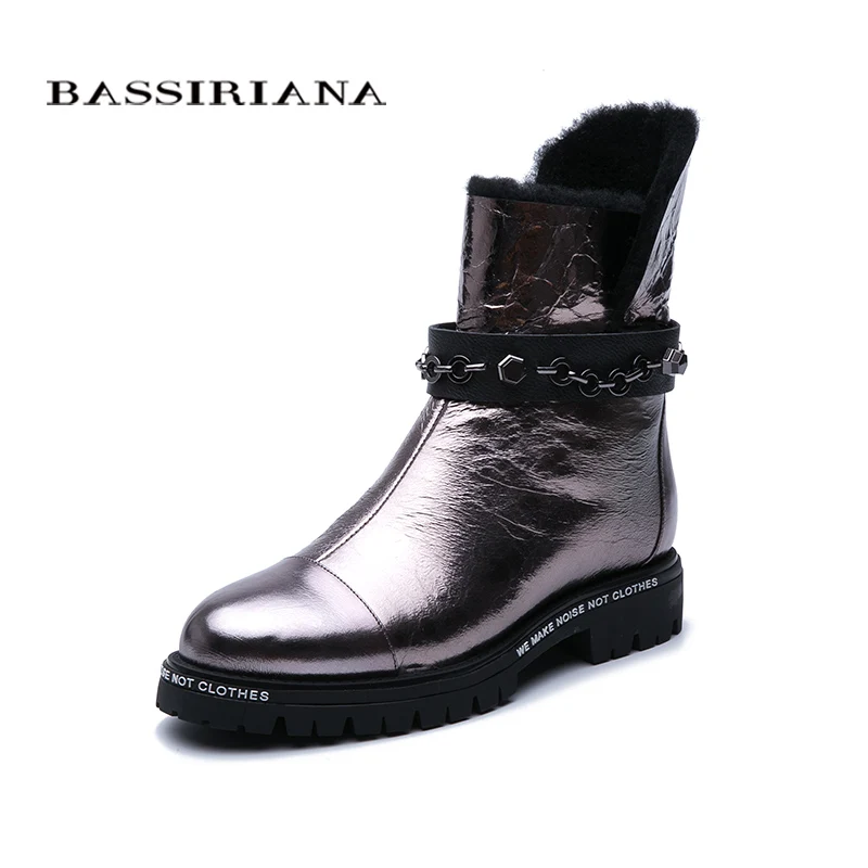 

BASSIRIANA new. Snow boots. Natural fur to keep warm. Non-slip bottom. Metal leather. Fashion brand new.
