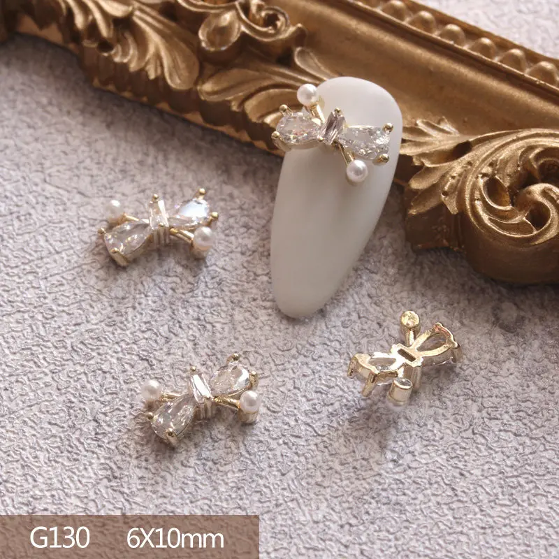 10 개/몫 3D 활 나비 사랑 합금 네일 아트 지 르 콘 진주 금속 매니큐어 손톱 Accesorios 용품 DIY 네일 장식 매력