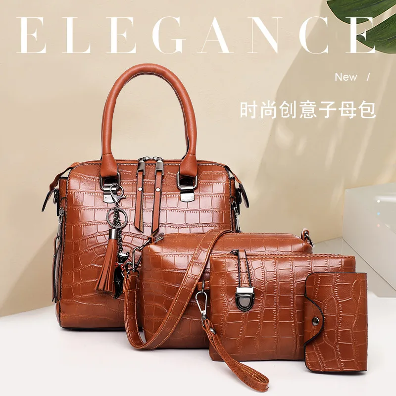 

2019 Korean version 4-piece handle mother bag retro fashion one shoulder women's bag diagonal straddle bag women's bag solid Pu