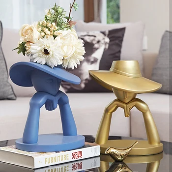 

Lady With Her Hands On Her Chin Wearing A Golden Blue Hat Art Vase Resin Flower Arrangement Vase Creative Artificial Flower Vase