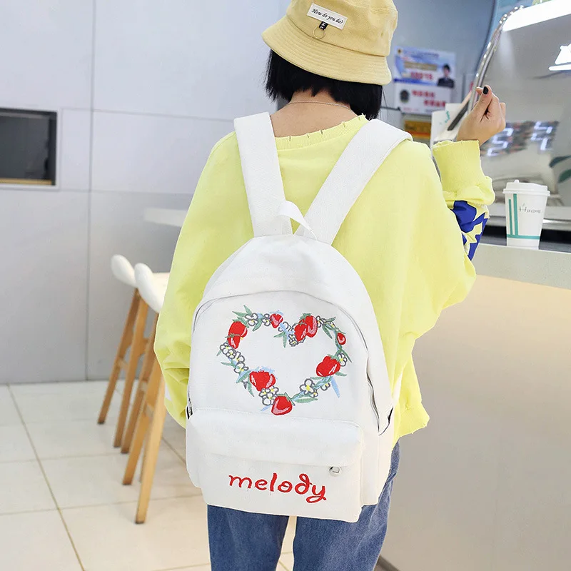 

Dazzling heart-shaped letter printing large capacity impact color junior high school students bag double shoulder bag schoolbag