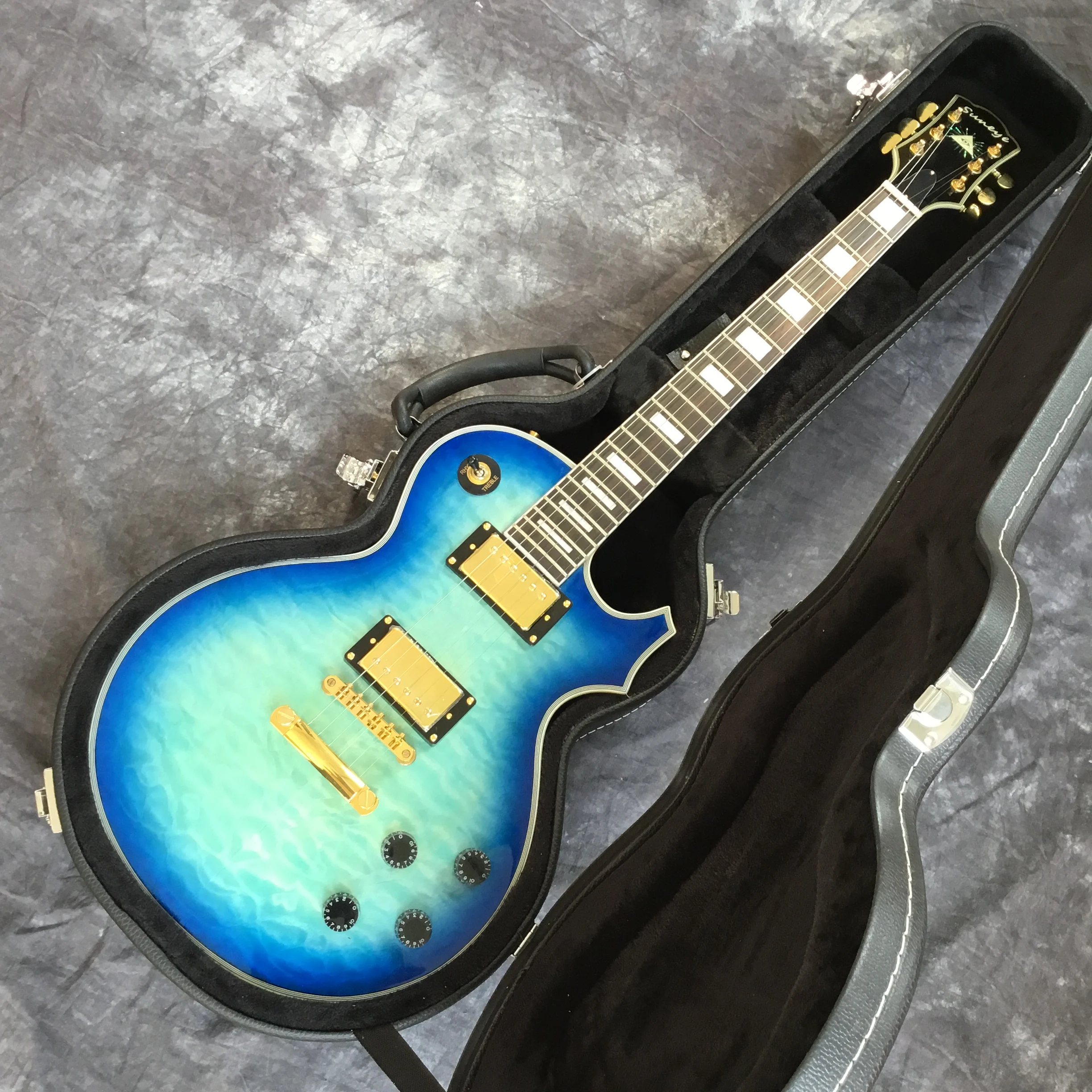 New electric guitar. High quality guitar pickups. Blue color tiger flame gitaar. Gold color hardware. free shipping