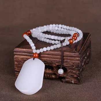 

Gold jade jade pendant necklace