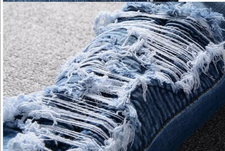 New men's fashion hole blue hip hop jeans Korean men's slim large size jeans men's trousers