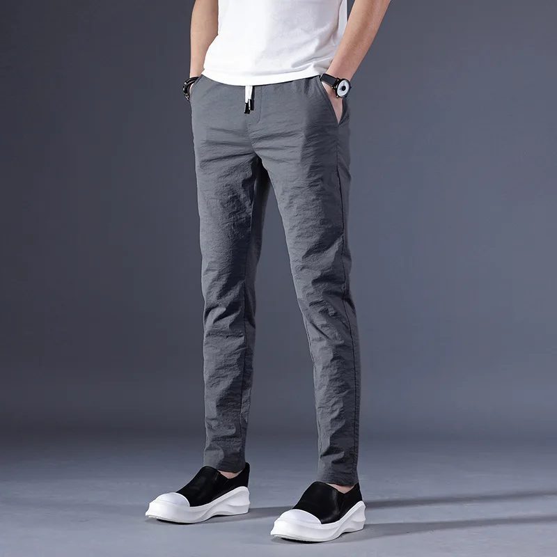 

Spring New Style Lace-up Elasticity Slim Fit Skinny Pants Teenager Fashion Casual Quick-Dry Skinny Trousers Fashion Pants 6666