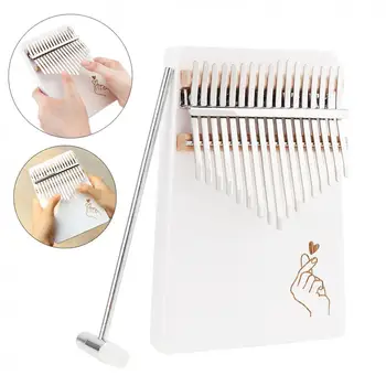 

17 thumb piano Kalimba finger heart-shaped pattern solid board unique pine turntable keyboard instrument hammer