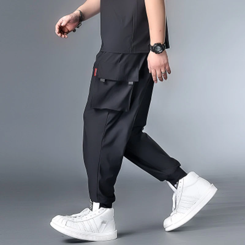 

Plus Size 6XL 7XL Men Joggers Multi-Pocket Overalls Solid Men's Harem Pants 2020 Summer Casual Men Trousers Men's Ice Silk Pants