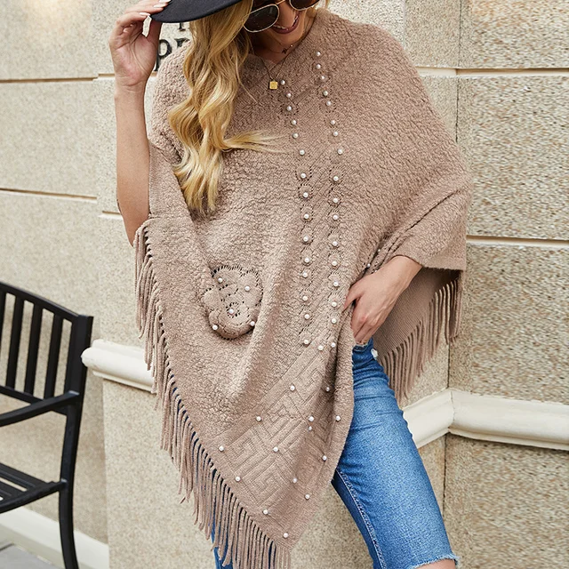 Sweater ponchos with pearls attached