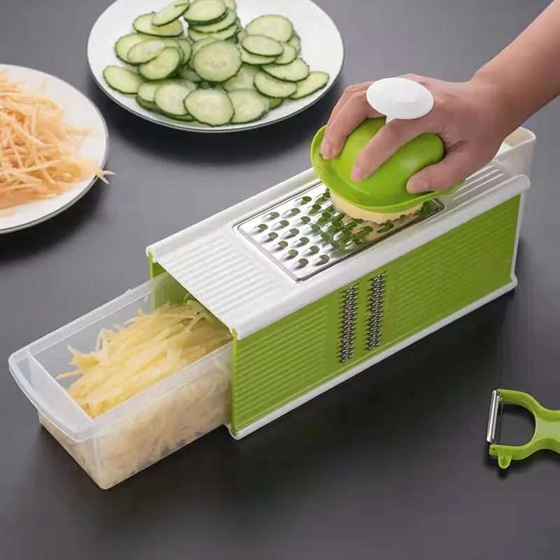 https://ae01.alicdn.com/kf/H996a6509549741bcb2e14313cfcdf7bbH/Multifunctional-Vegetable-Slicer-Multi-Cutter-Grater-for-Vegetables-Peeler-Carrot-Fruit-Cutting-Kitchen-Accessories-Cutter.jpg