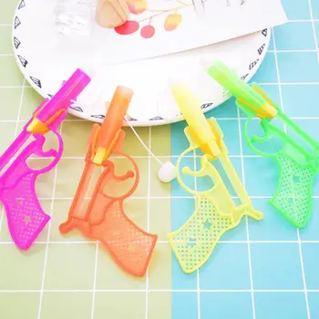 

10pcs/set new Bullet Rubber Band Launcher Plastic Gun Hand Pistol Guns Shooting Toy Boy Outdoor Fun Sports For Kids Classic gift