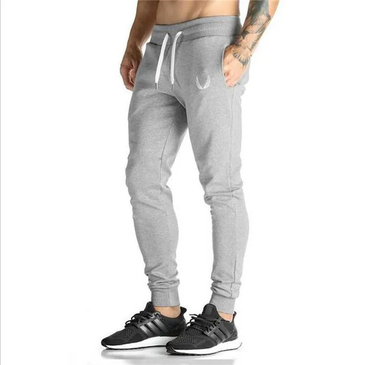

Sport Drawstring Waist Jogging Pants Men Outdoor Gym Running Workout Sportswear Loose Fashion Casual Training Pants Sweatpants