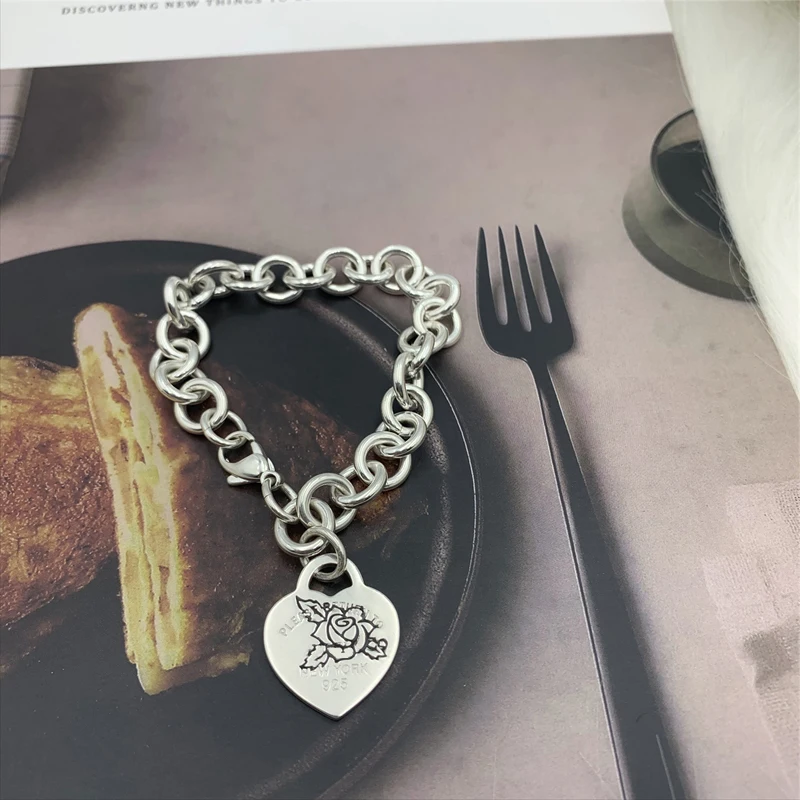 

SHINETUNG S925 sterling silver, mini rose heart tag bracelet, 1: 1 high-end women's jewelry with logo.