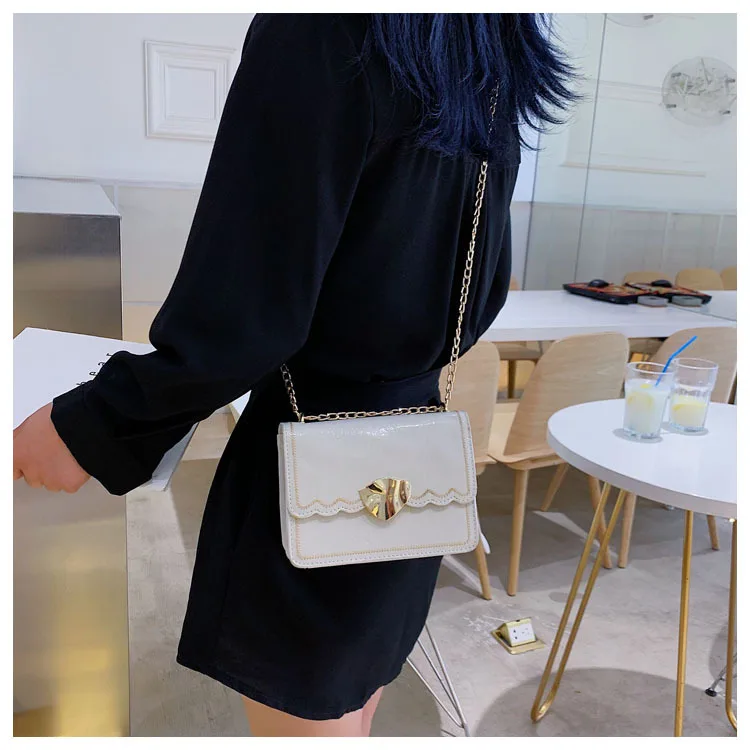 Irregular leaf magnetic buckle women's bag new summer small fresh car stitching shoulder slung chain small square bag