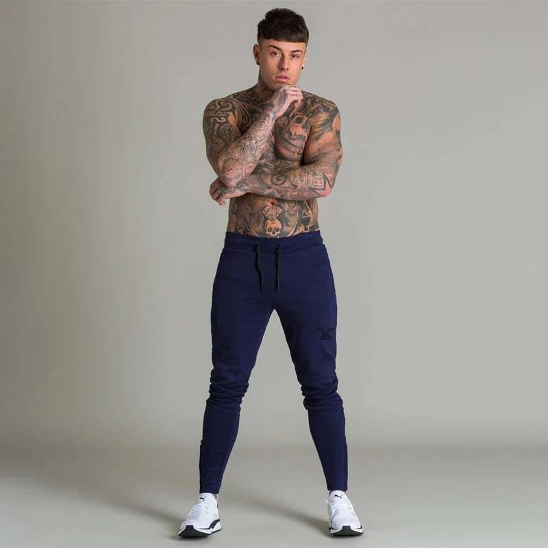 Новые популярные мужские спортивные штаны jogger модные спортивные штаны уличная облегающие спортивные брюки мужские повседневные брюки
