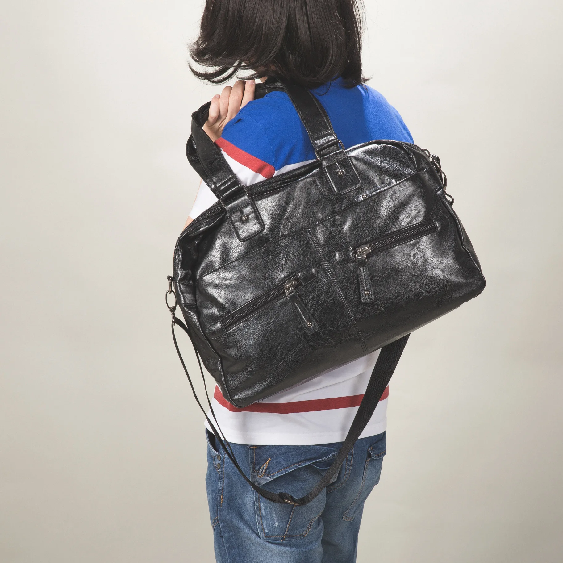 

Cross Border AliExpress PU Leather Travel Handbag Waterproof Fitness Backpack Luggage Customizable Manufacturers a Generation of