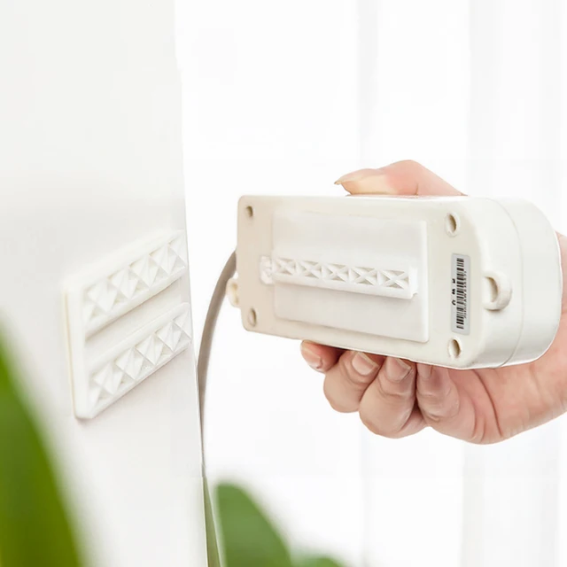 1Pcs Falra Szerelt Matrica Lyukasztás Nélküli Dugó Rögzítő Otthoni Önfalapozó Kábelhuzal-Szervező Asztali Power Szalag Tartó