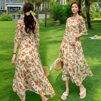 

The new flower fairy seaside holiday chiffon dress harness a word shoulder v-neck long knee-length dress