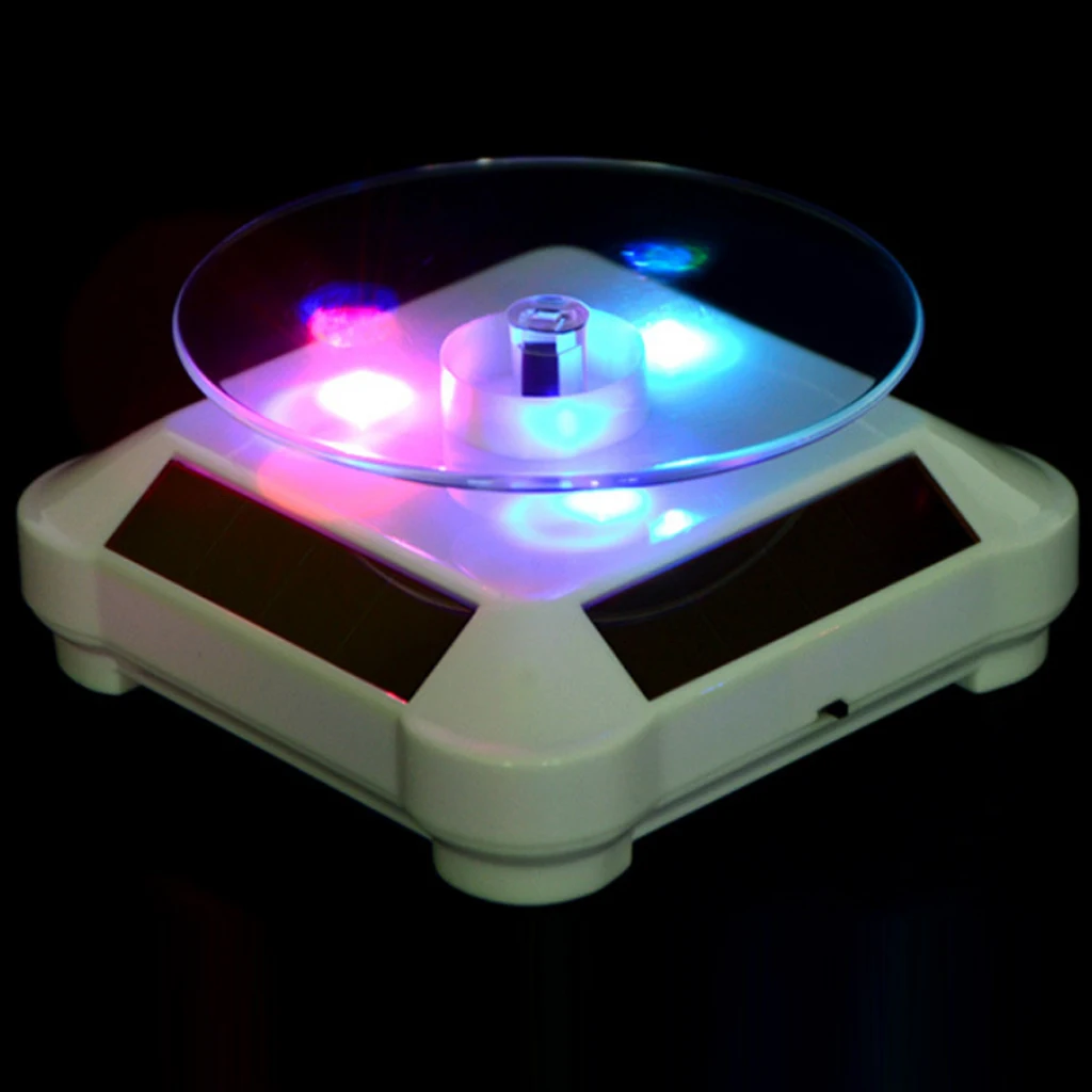 Solar Powered / Battery Rotating Display Stand Turntable with LED Light for Jewelry Watch 360 Degree Rotating Display Stand Solar Powered / Battery Rotating Display Stand Turntable with LED Light for Jewelry Watch 360 Degree Rotating Display Stand
