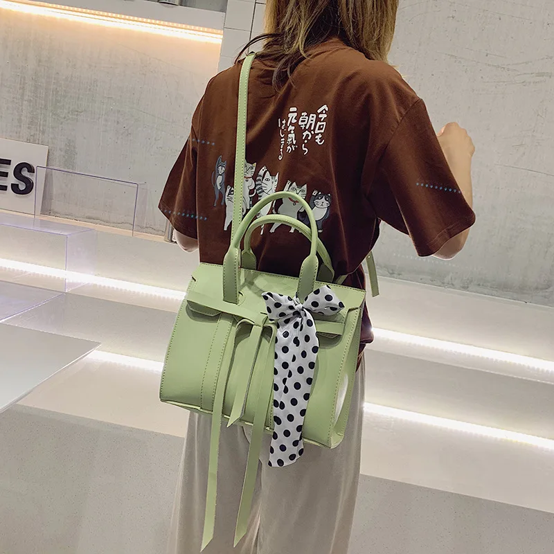 

New stereoscopic lady's bag with bow-knot wavy point silk scarf and one shoulder slanting