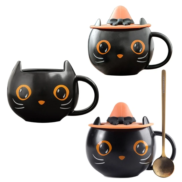 Handmade ceramic mug with witch cat design and a super cute magic