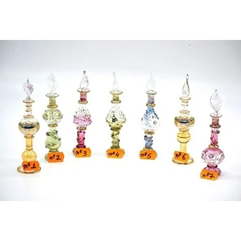 

7 Esencieros perfumeros de cristal grupo 6/15 cm.