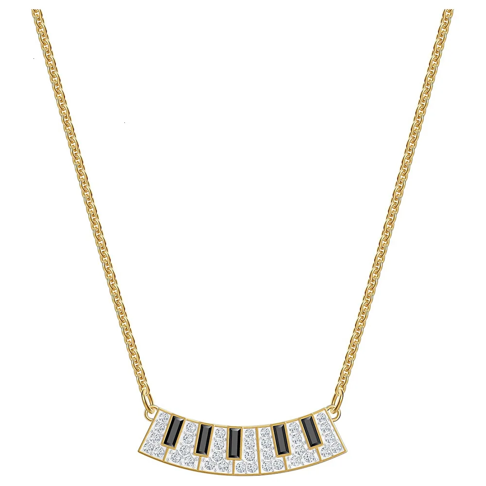 

New quality swa necklace with lovely black and white piano key pendant
