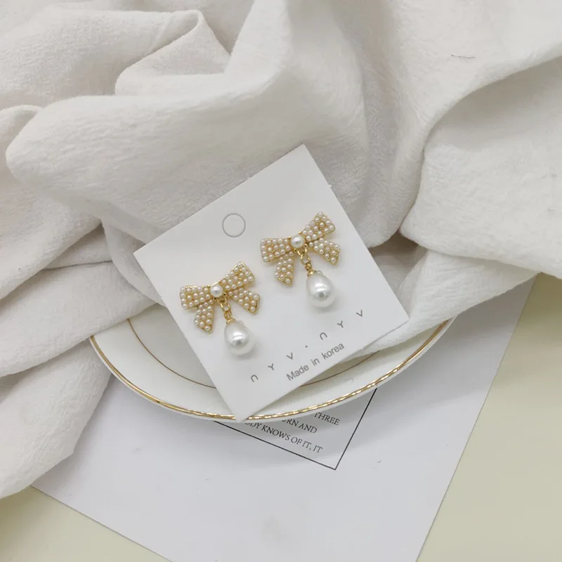 

Korean Simple Temperament Simulation Pearl Bowknot Dangle Earrings For Women Jewelry Sweet Girl Personality Drop Earrings Party