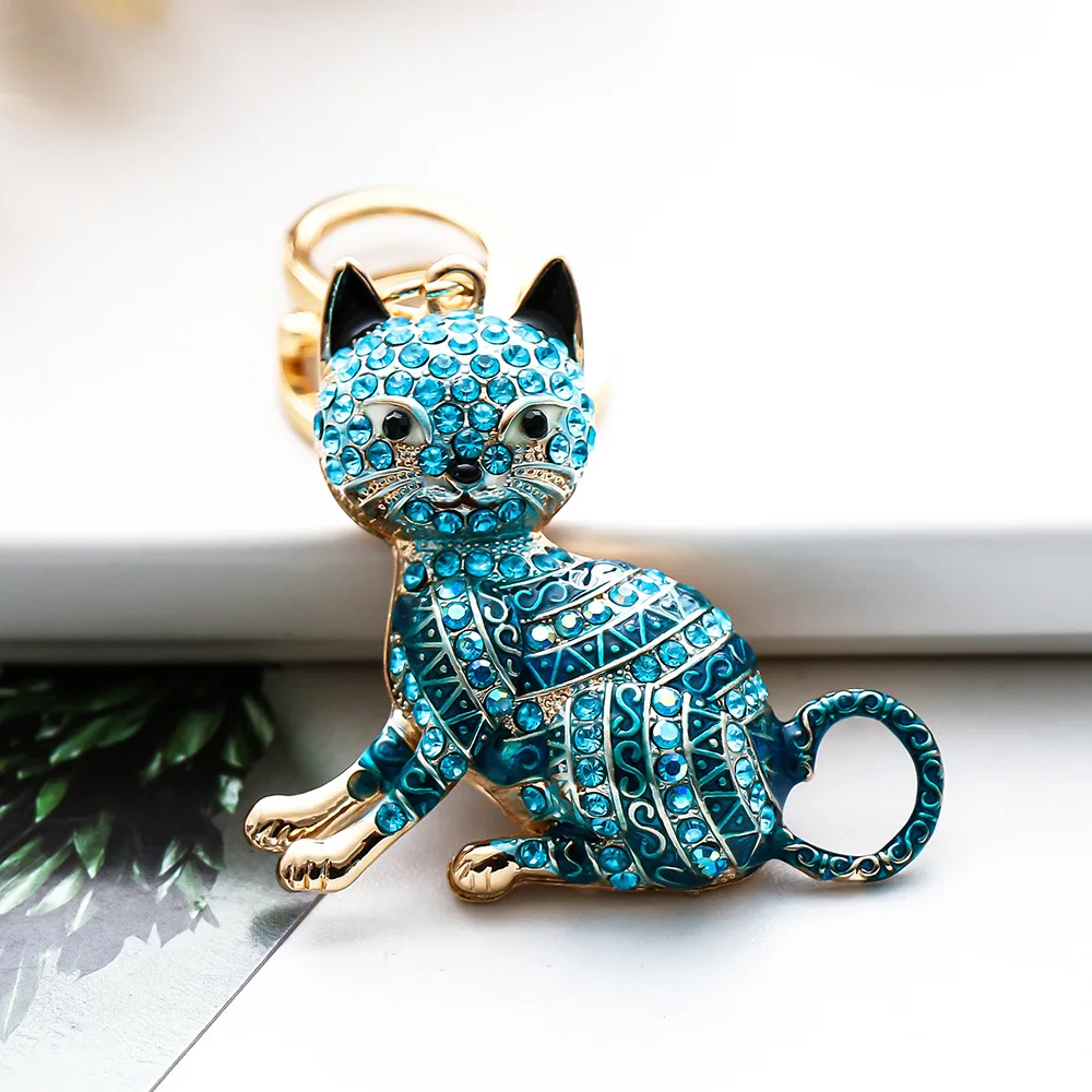 XDPQQ nowy kolor Rhinestone kot kreskówkowy kreatywny metalowy brelok niestandardowy wisiorek do samochodu producent sprzedaży bezpośredniej drobne upominki