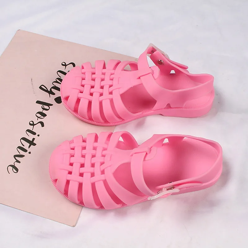 Los niños de verano sandalias bebé niña suave antideslizante zapatos de princesa Zapatos Niños caramelo zapatos Jelly de playa niños Casual romano zapatillas