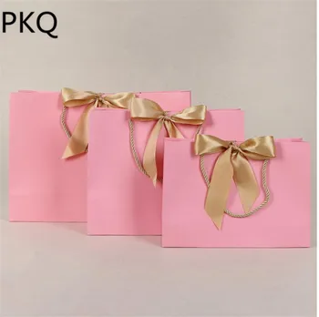 

15Pcs/lot Large Clothes Packaging Bag Paper Present Bag with ribbon Boutique/Cosmetic Gift Bags Christmas Bag 32*25*11cm