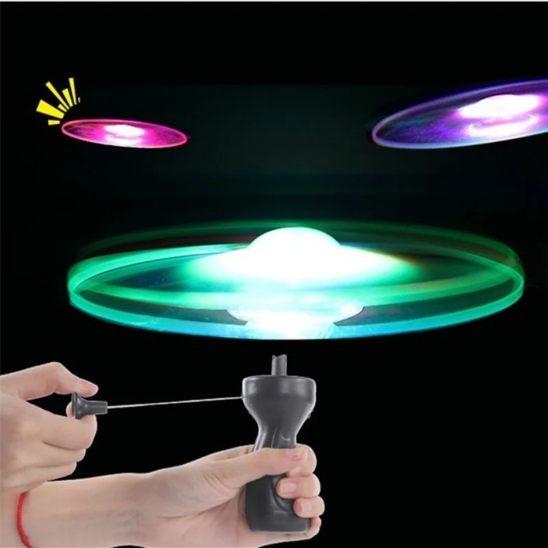 

toy Funny Spinning Flyer Luminous Flying LED Light Handle Flash Flying Toys for Kids Outdoor Game Color Random