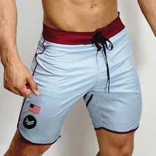 Новинка, летние дышащие мужские сетчатые шорты для фитнеса, бодибилдинга, модные повседневные спортивные штаны для бега, длина до колен, сшивание шорт