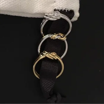 

The new color separation gold silver color double knot knot ring simple fashion
