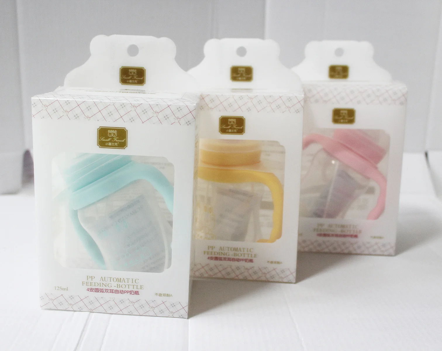 

Xiaofulanke 9124 4 Ann Arc Dual Handle Automatic Feeding Bottle