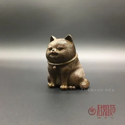 

Украшение в виде японского чайного питомца с изображением маленькой толстой кошки