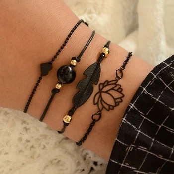 

4PCs Gothic Black Feather Lotus Bracelets Set Heart Charm Boho Bangles for Women Wrist Chain Bracelets Fashion Jewelry